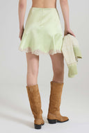 Pure silk satin mini skirt with contrasting rebrodé lace