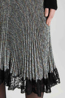 Below-the-knee pleated skirt in cady with resca print and contrasting lace hem