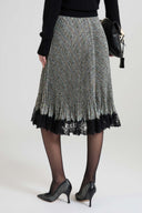 Below-the-knee pleated skirt in cady with resca print and contrasting lace hem