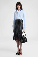 Crocodile-print calfskin midi skirt with handmade lace hem