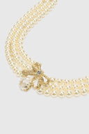 Collana choker di perle con fiocco scultoreo e cristallo