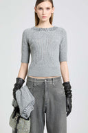 Short-sleeved cashmere sweater with cable knit, openwork and crystals