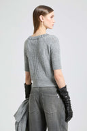 Short-sleeved cashmere sweater with cable knit, openwork and crystals