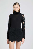 Long-sleeved virgin wool turtleneck sweater with lace and crystals