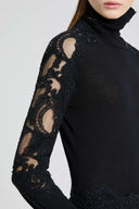 Long-sleeved virgin wool turtleneck sweater with lace and crystals