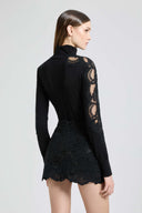 Long-sleeved virgin wool turtleneck sweater with lace and crystals