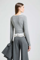 Layer-effect cashmere sweater with lingerie-inspired details