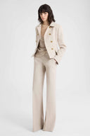 Wide-leg tailored trousers with heraldic buttons