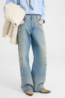 Jean baggy couture à broderies et cristaux