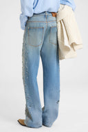 Jean baggy couture à broderies et cristaux
