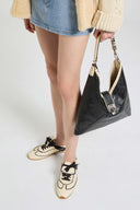 Winner sneakers in vintage-effect two-tone shearling