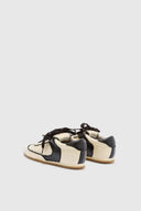 Winner sneakers in vintage-effect two-tone shearling