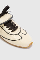 Winner sneakers in vintage-effect two-tone shearling