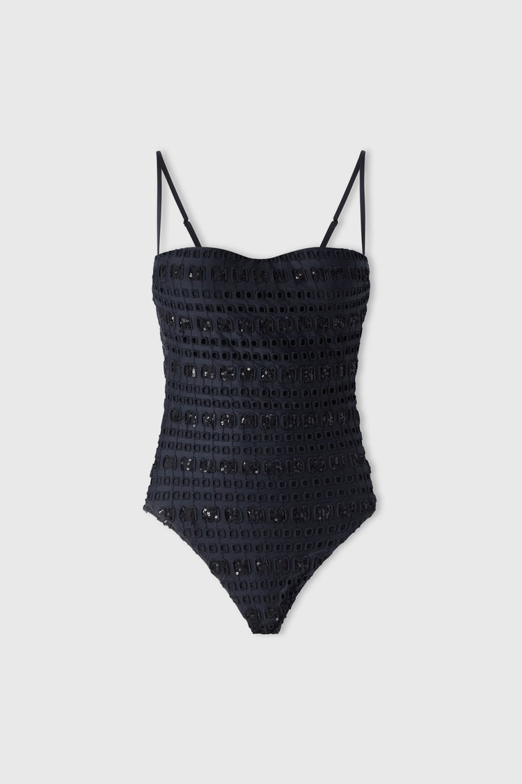 Black one-piece macramé swimsuit with removable straps and a sequin ribbon.